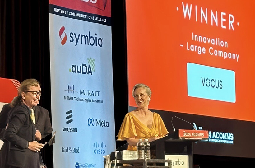 Vocus Chief Executive Officer, Ellie Sweeney accepting the 2024 Innovation Large Company ACCOMM Award