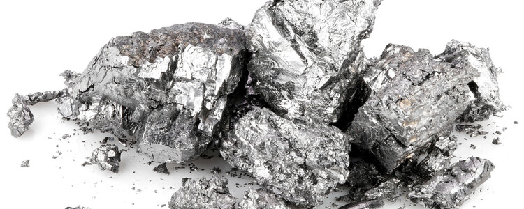 Beryllium metal chunks on white background