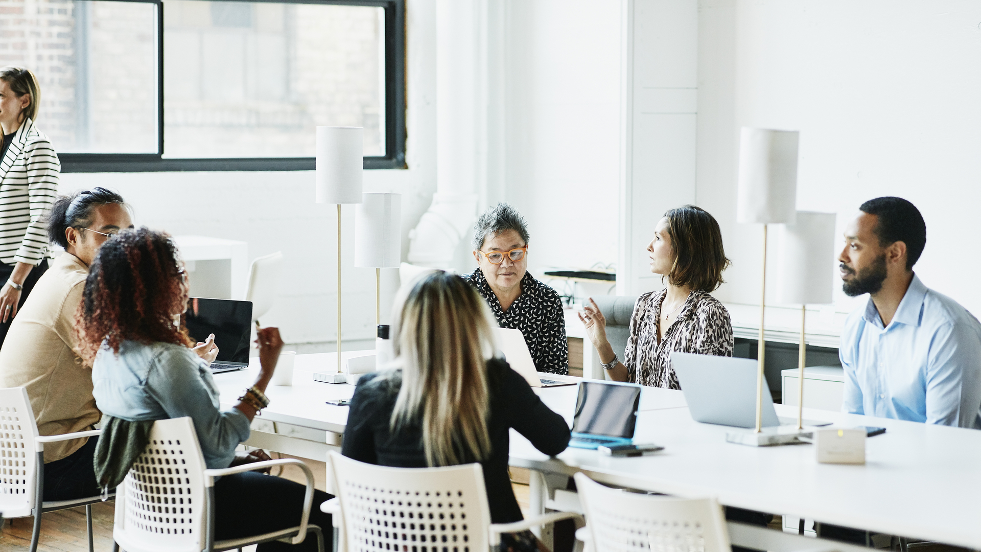 Businesspeople working in coworking office