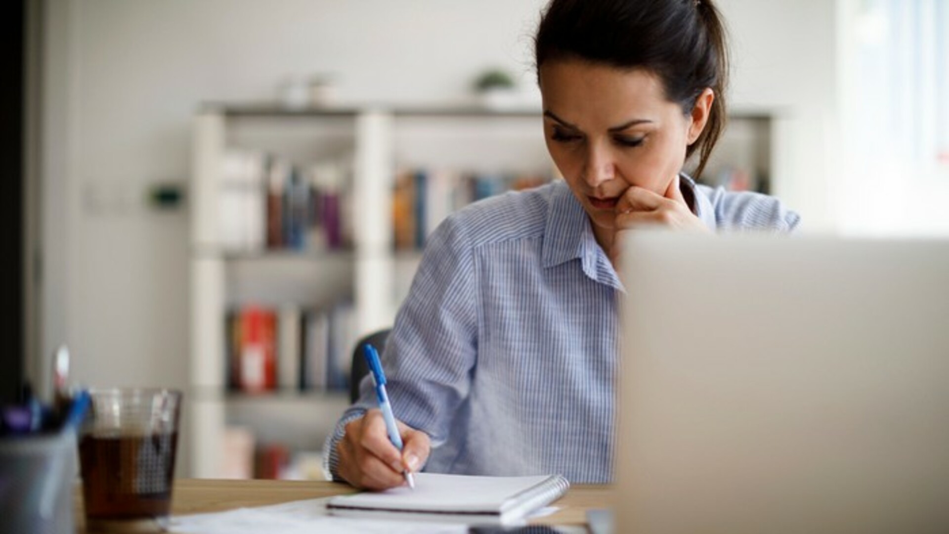 woman taking notes.jpg