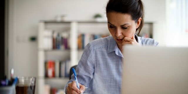 woman taking notes.jpg