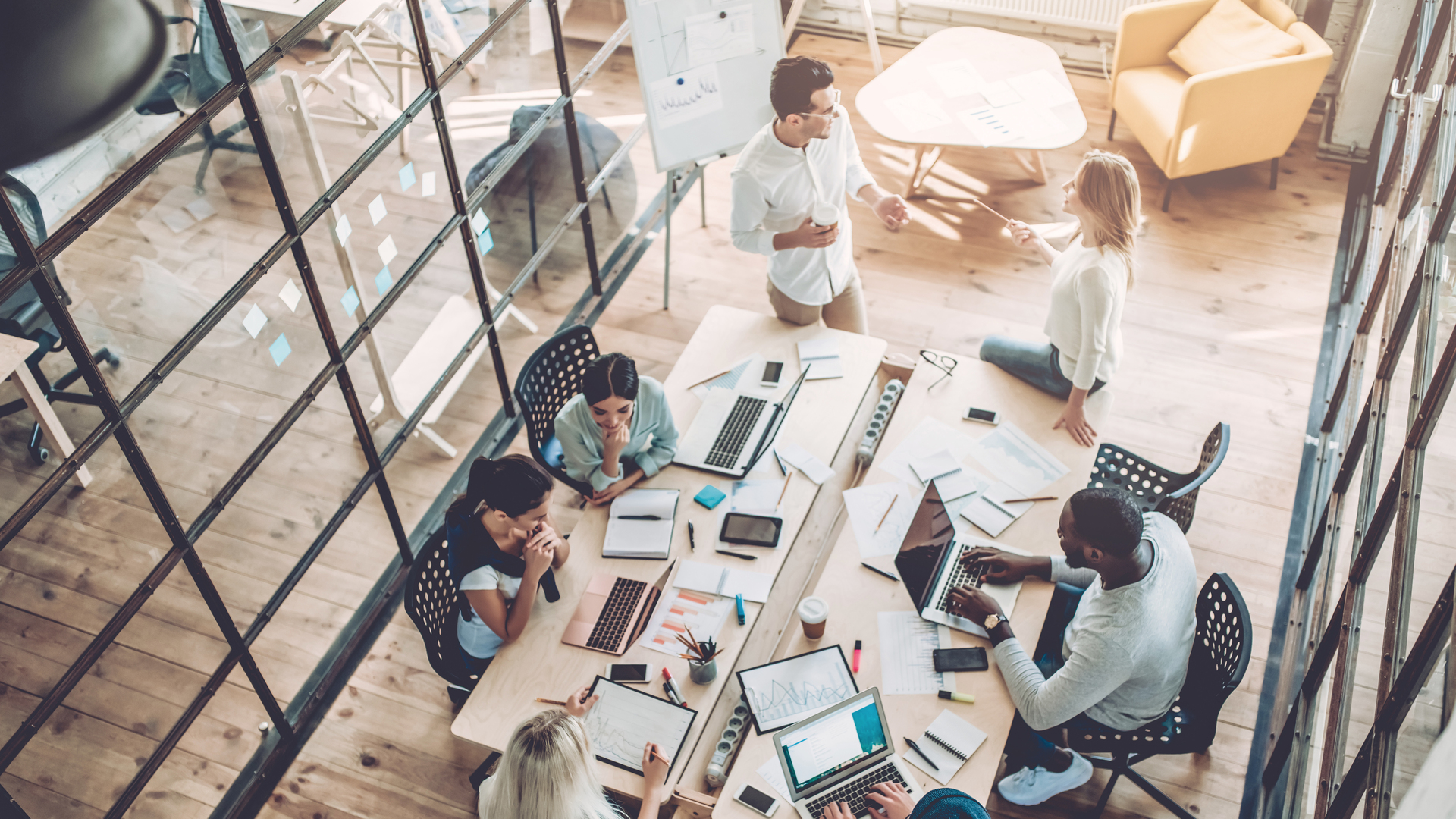 Young people work in modern office.