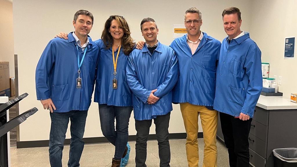 Picture of Former Vocus Chief Executive, Enterprise & Government, Andrew Wildblood and team dressed in scrubs in the USA