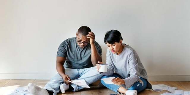 Couple reviewing their debt.jpeg