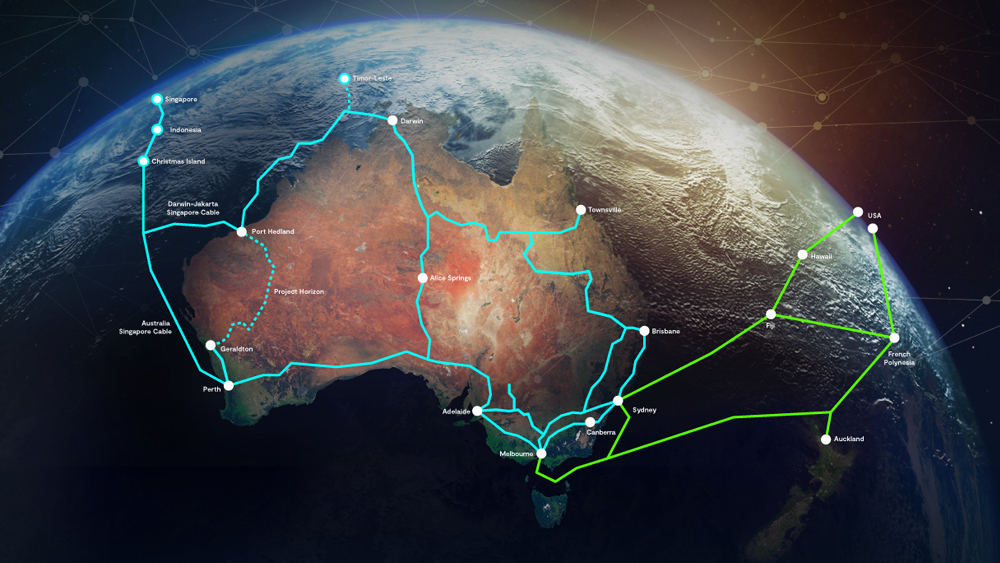 The image shows a map of Australia overlaid on a view of Earth from space. The map highlights various interconnected routes across the continent, marked with blue and green lines. These routes likely represent major infrastructure networks such as telecommunications or transportation systems. This visually represents the connectivity and network infrastructure within Australia, emphasizing its importance in linking different regions of the country.