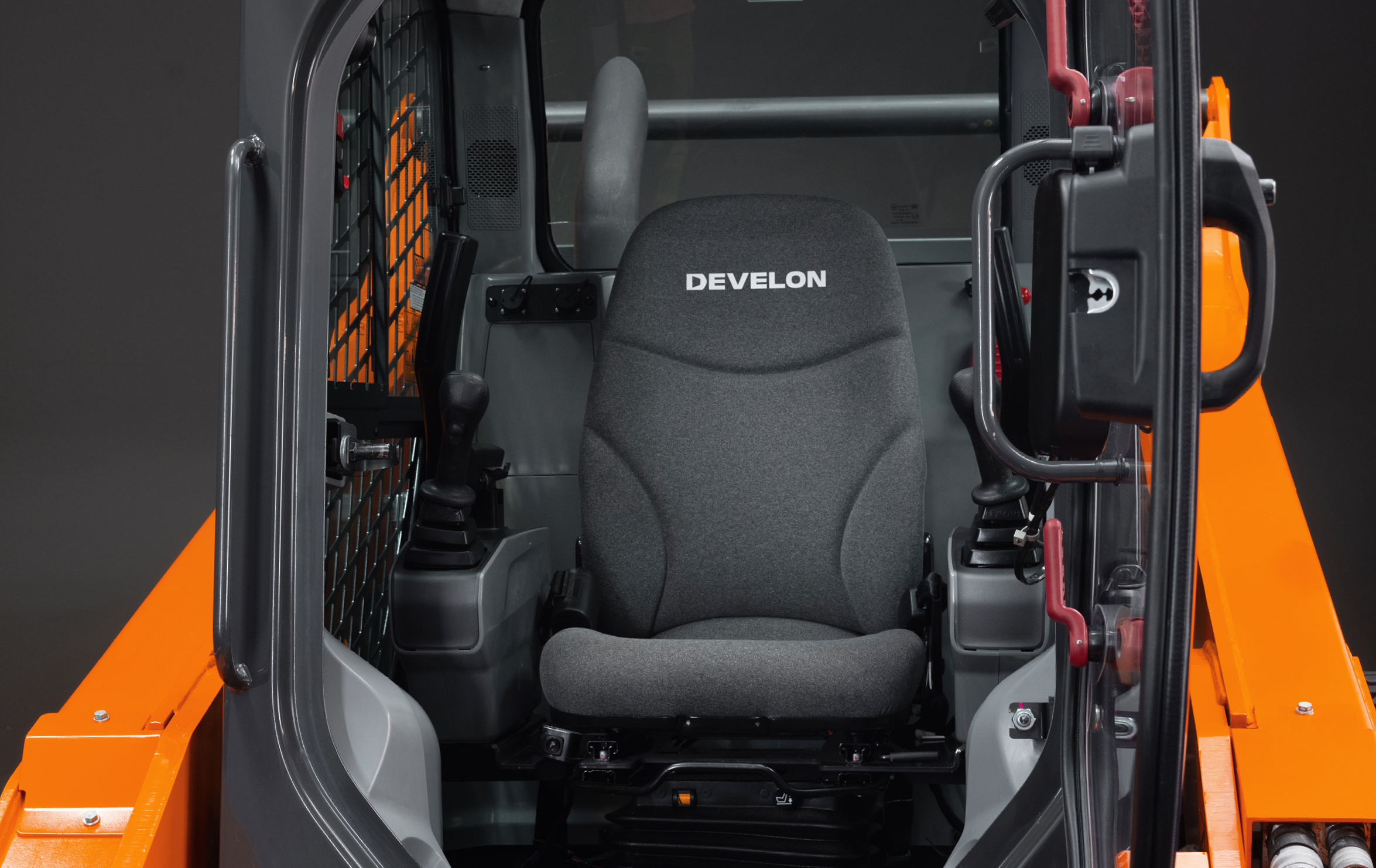 The in-cab of the DEVELON compact track loader