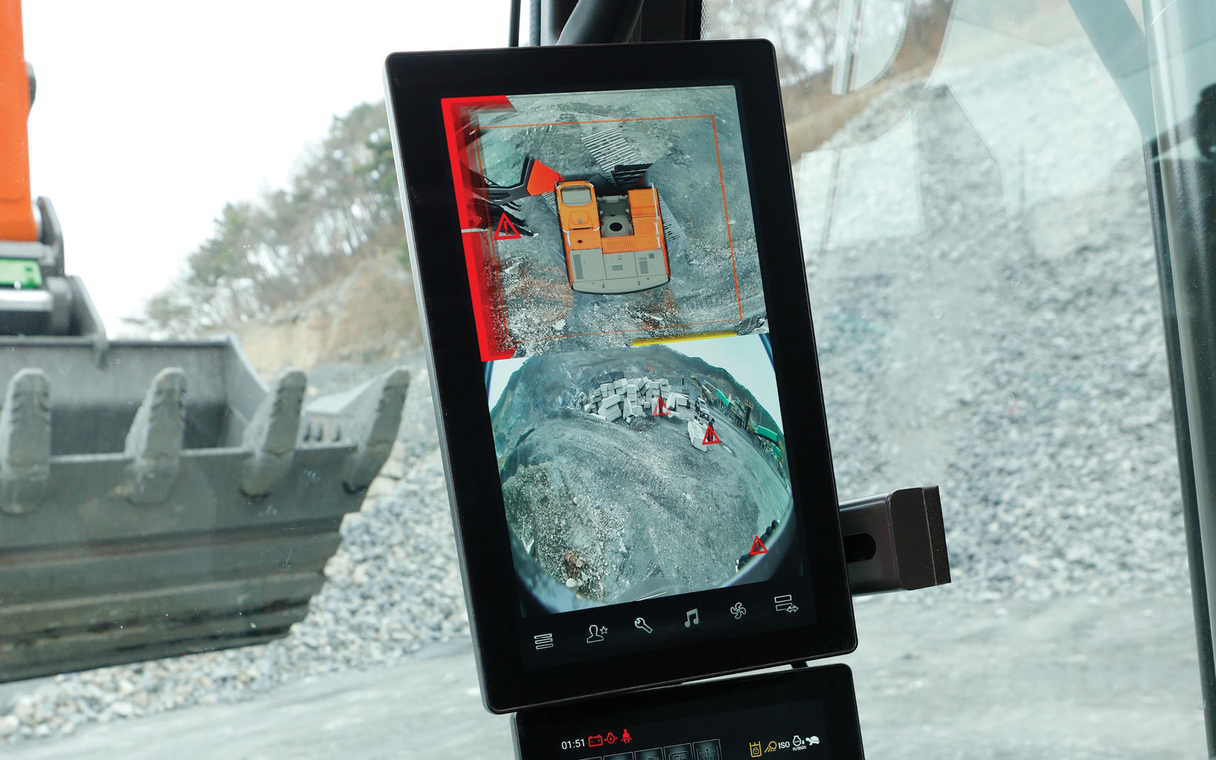 Smart around view monitor (SAVM) camera system on a display in a DEVELON -9 Series excavator cab.