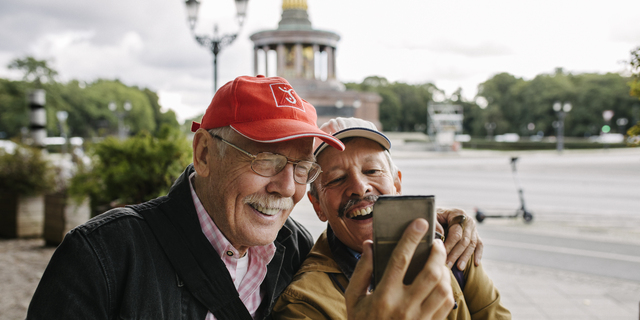 Mature Gay Couple Taking Selfie Together