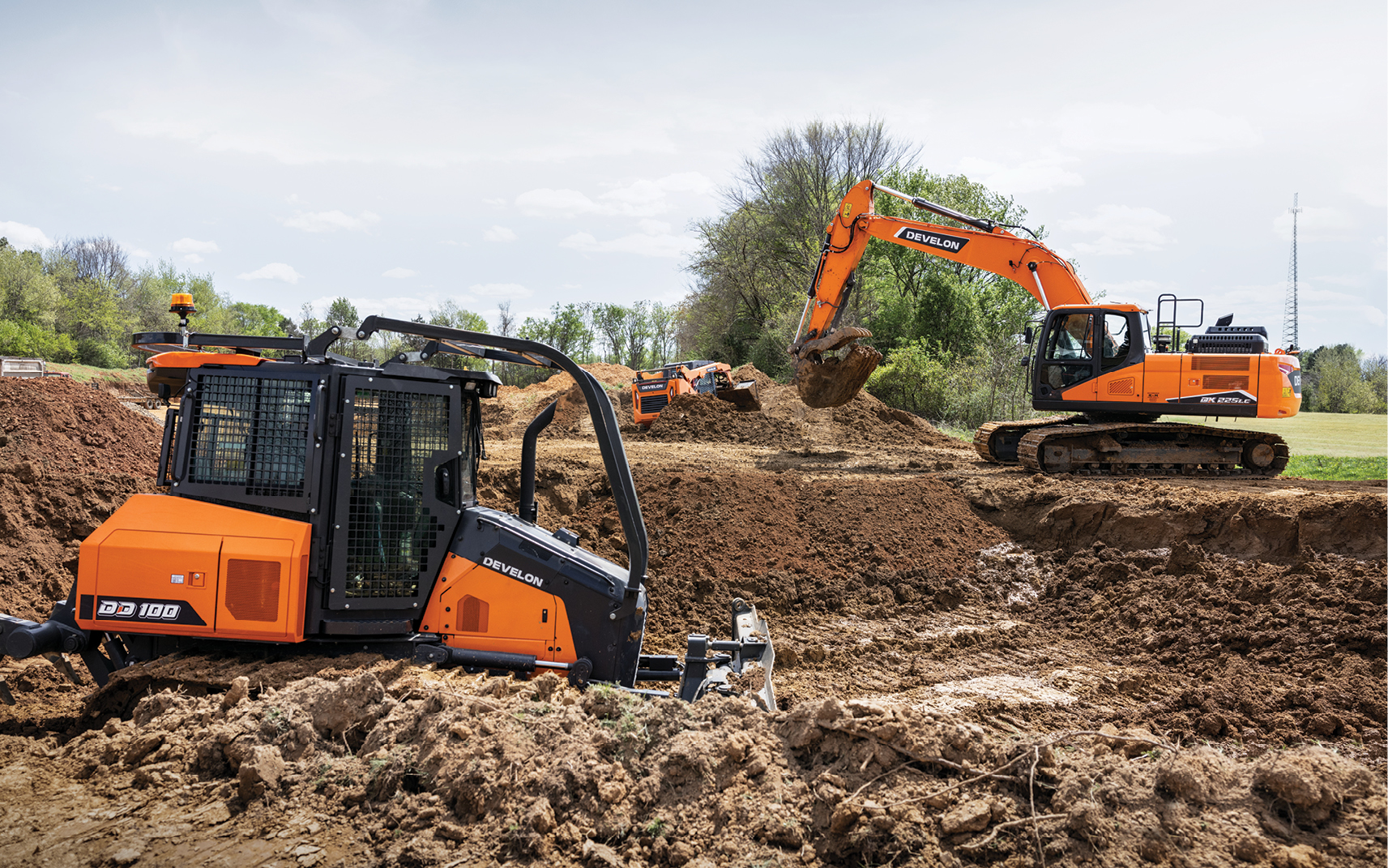 DEVELON dozer and crawler excavator working on a job site.