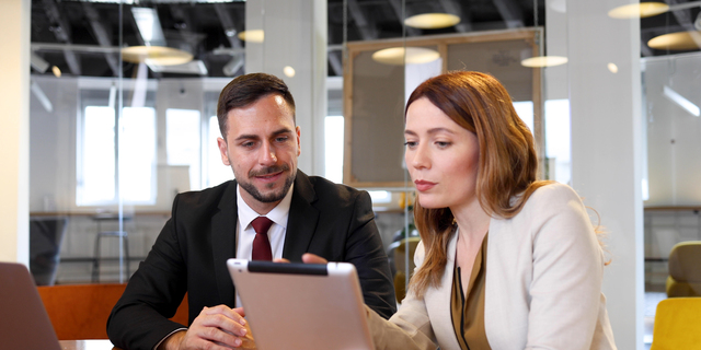 Colleagues finding some good business solutions