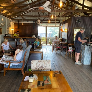 Cafe in Buderim with people and a view out the window