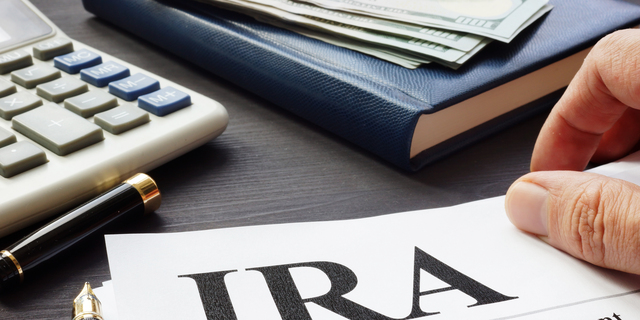 Documents about Individual retirement account IRA on a desk.