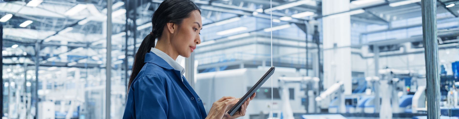 Female lab tech using a tablet 