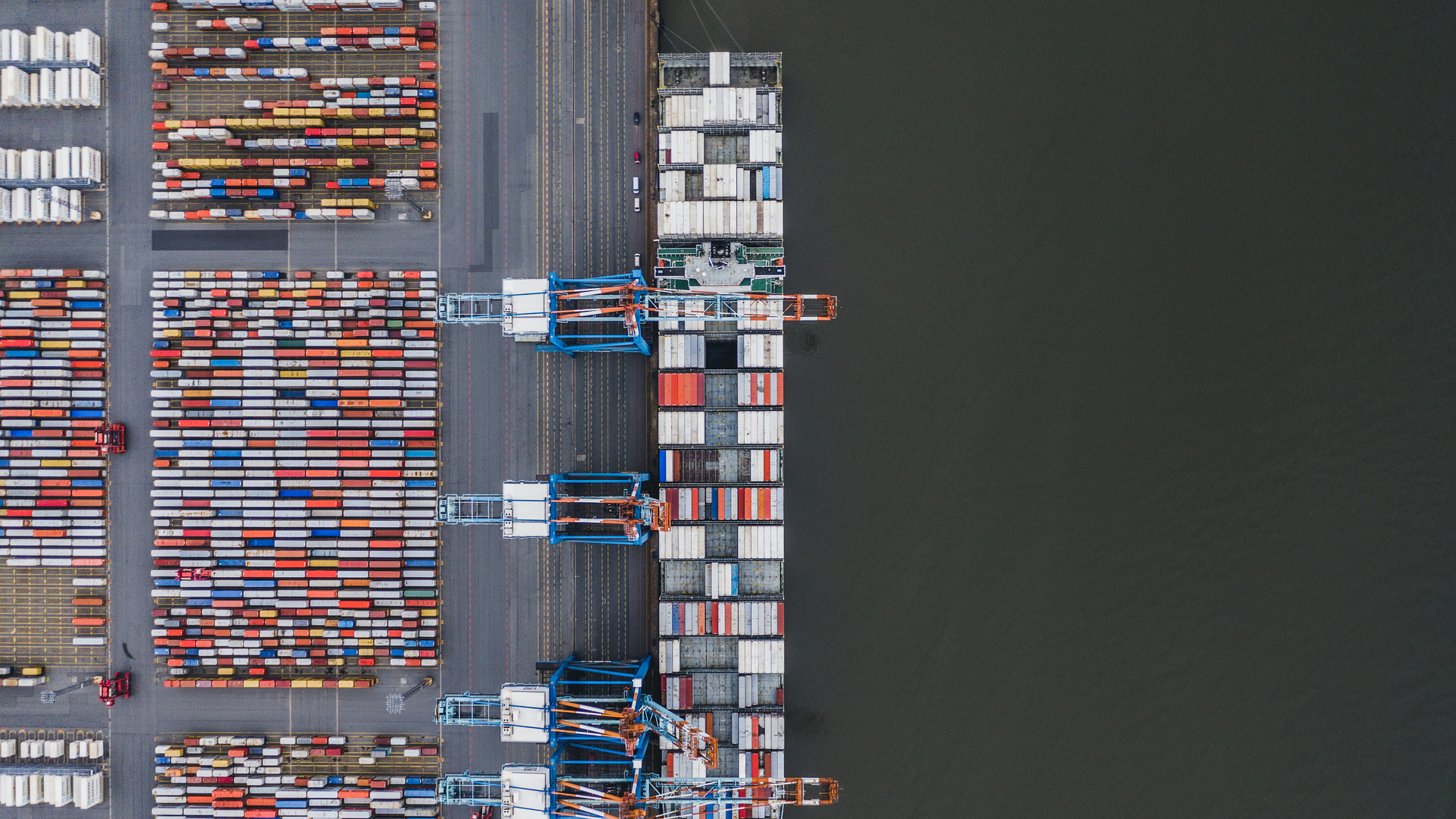 Container ship docked in port as seen from above, Germany