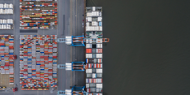 Container ship docked in port as seen from above, Germany