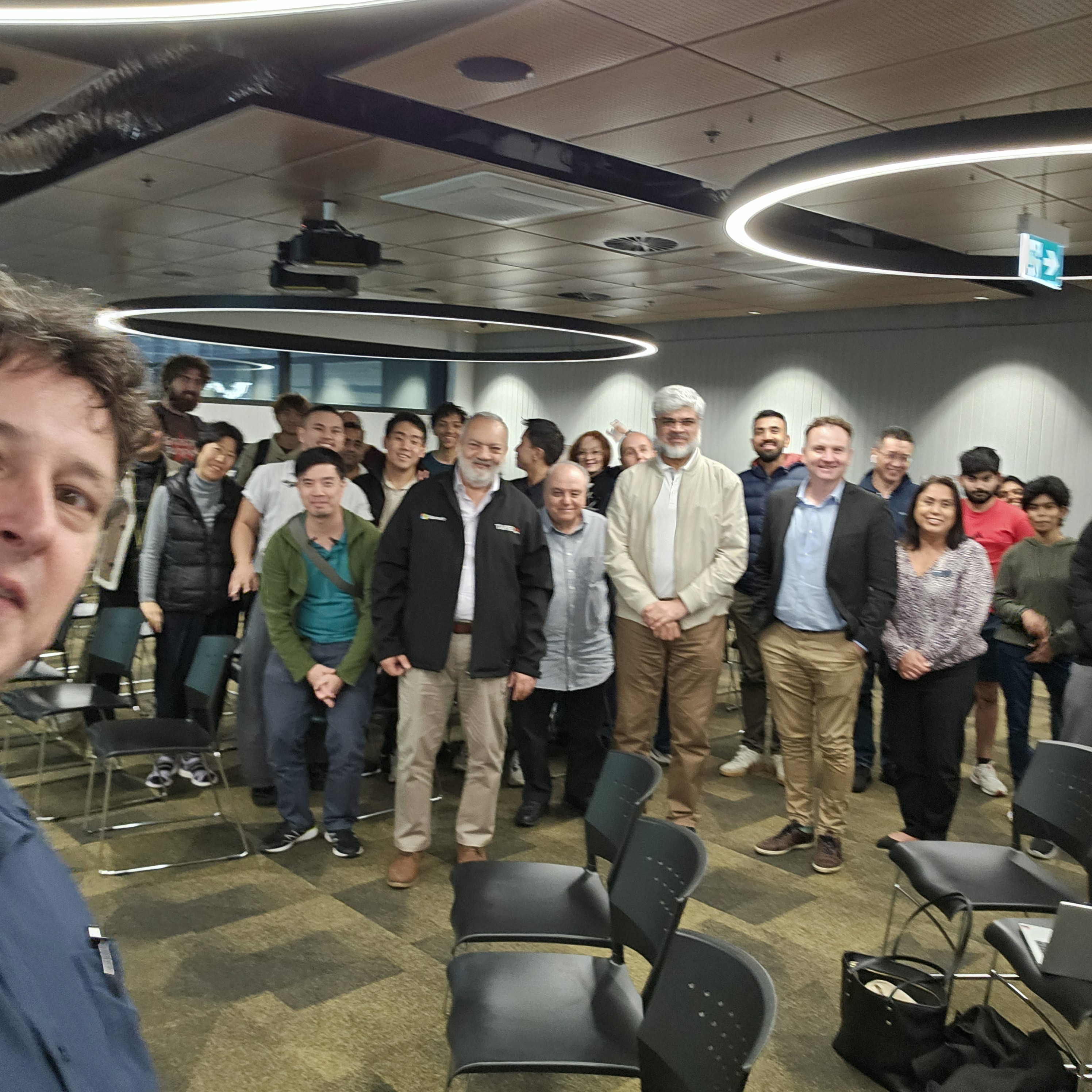 Selfie of James Stanger with group of learners
