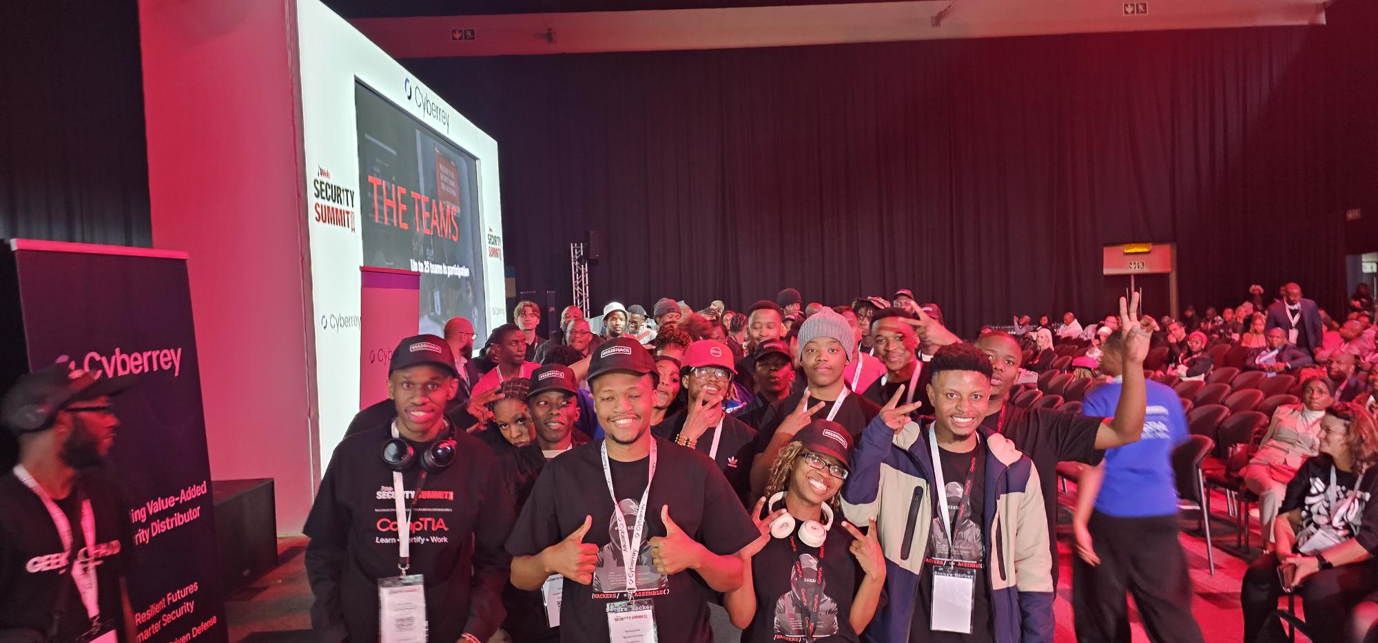 Selfie of James Stanger with group of learners