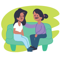 two people sitting and talking