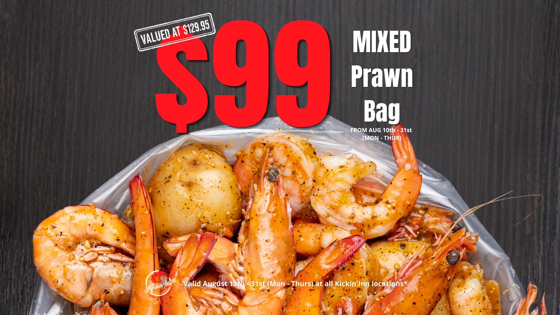 Kickin’Inn Mixed Prawn Bag featuring seasoned prawns, corn and potatoes in signature seafood sauce.