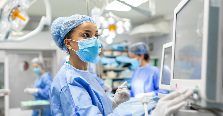 healthcare-provider-using-machine-in-operating-room.jpg
