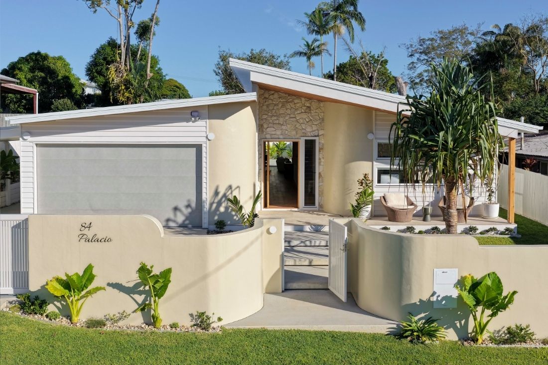 Single level home external view with rendered fence and garden.