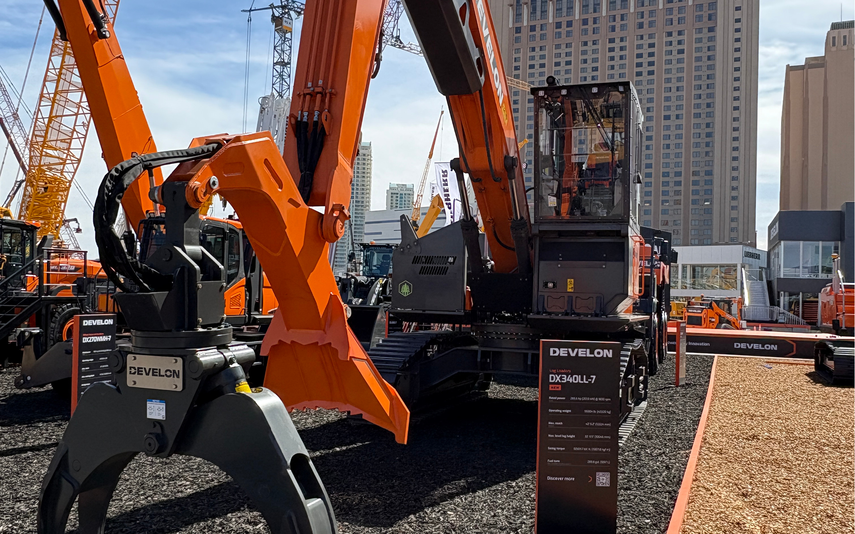 The new DX340LL-7 log loader on display at the DEVELON booth at CONEXPO 2026.