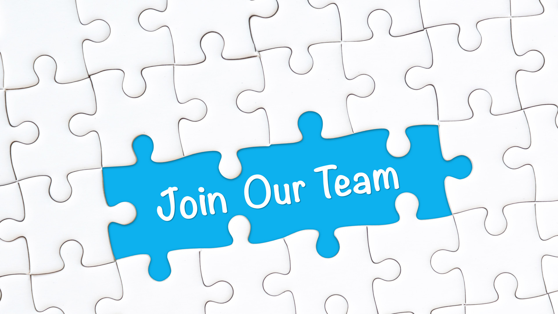 Join our team concept. White jigsaw puzzle with word and blue background