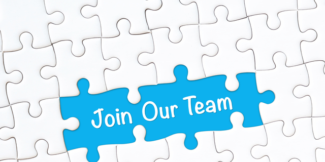 Join our team concept. White jigsaw puzzle with word and blue background