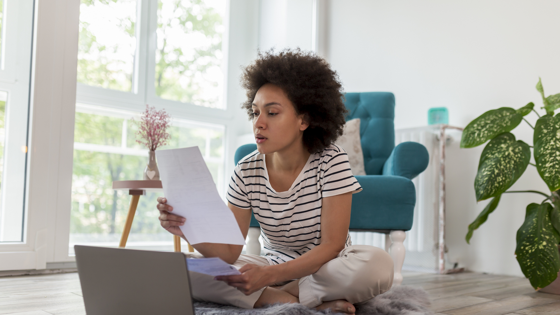 Woman paying bills online