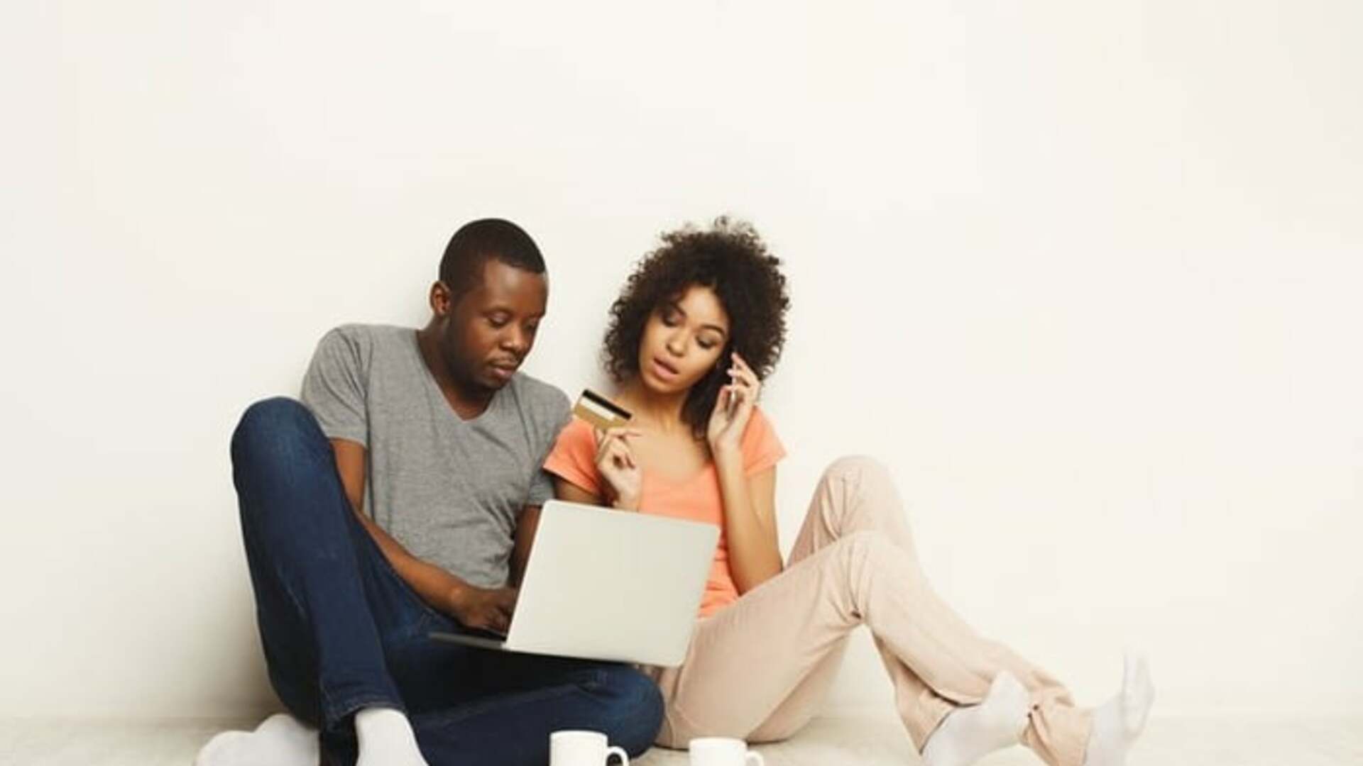 Couple looking at credit card bills.jpg