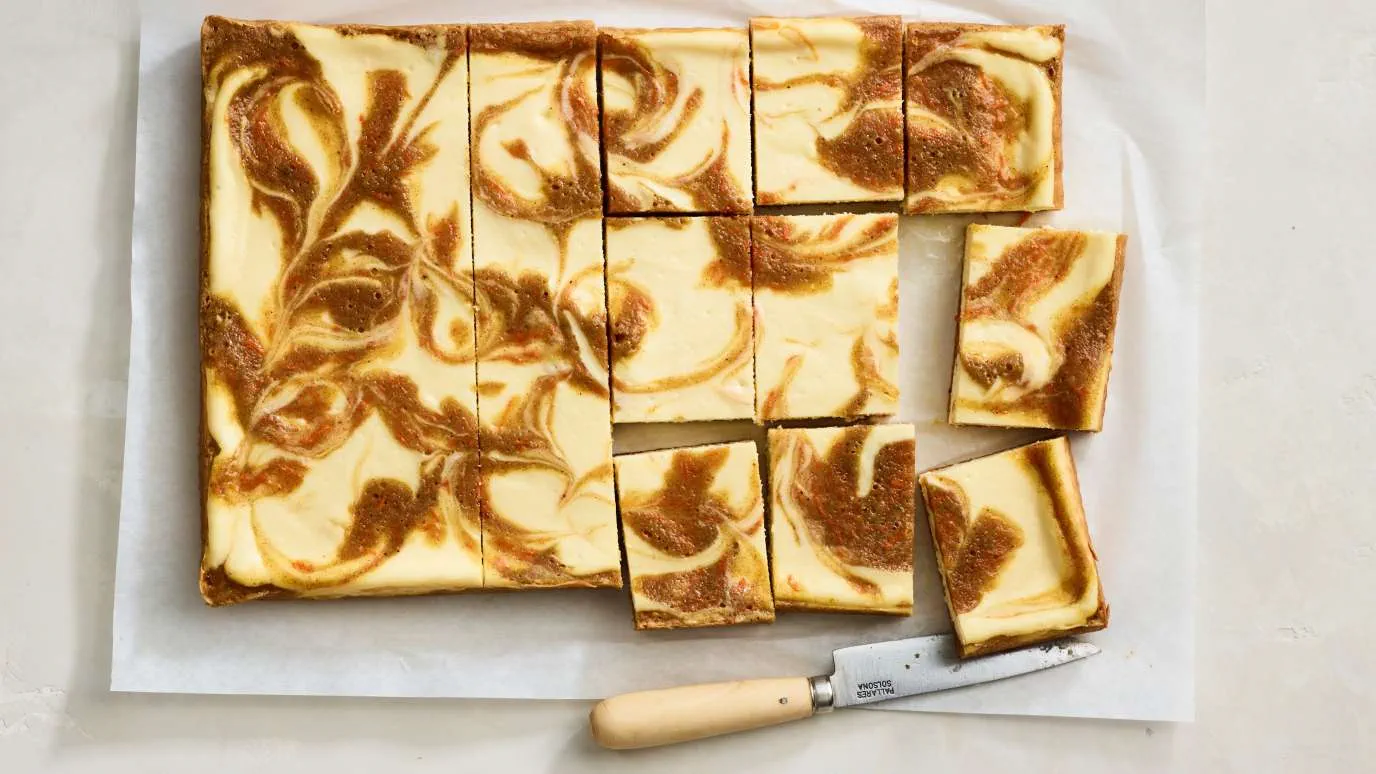 carrot_cake_swirled_cheesecake_bars_1376x774.webp
