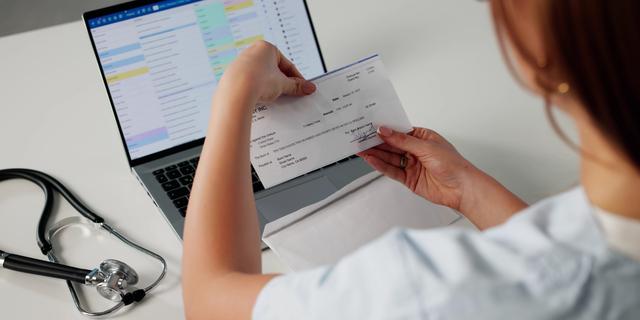 Financial Analyst Counting Money