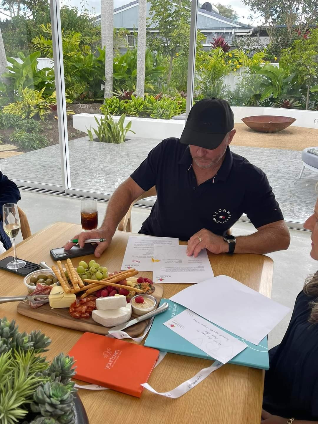 Draw 515 winner signing house paperwork