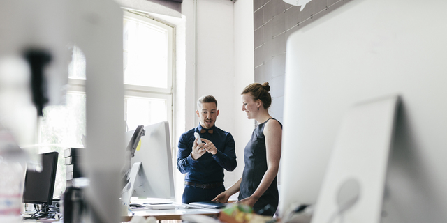 Startup Business Manager Talking To Employee