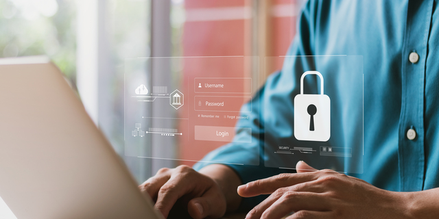 Cybersecurity and privacy concepts to protect data. Lock icon and internet network security technology. Businessmen protecting personal data on laptop and virtual interfaces.