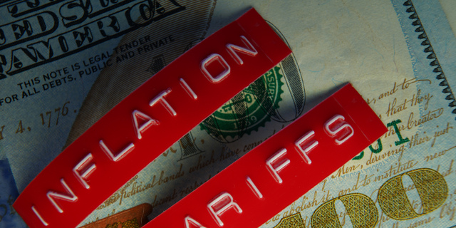 Red Tariffs and Inflation labels on a hundred dollar bill