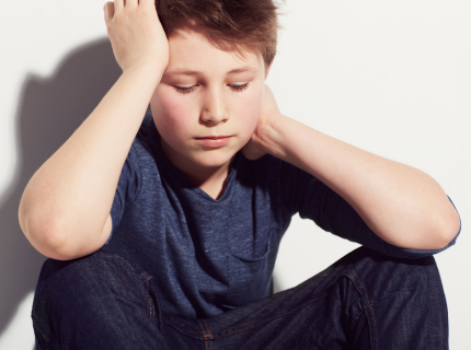 Boy looking sad and stressed