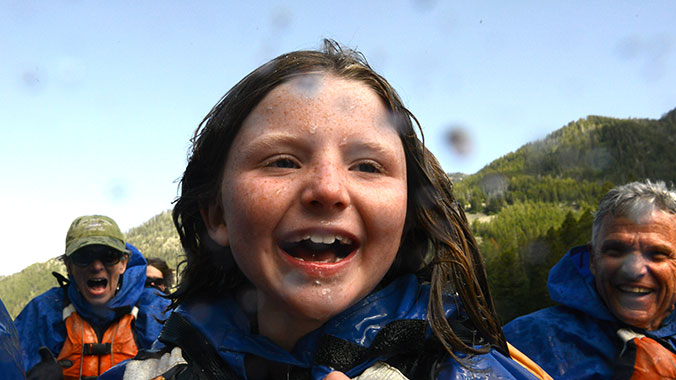 20884-montana-glacier-national-park-intergenerational-adventure-raft-ride-slide-girl-c.jpg