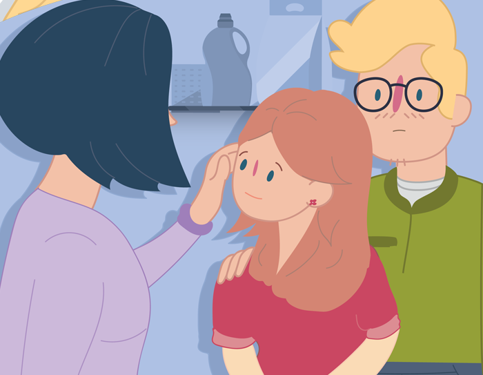 Divorced parents comforting their child