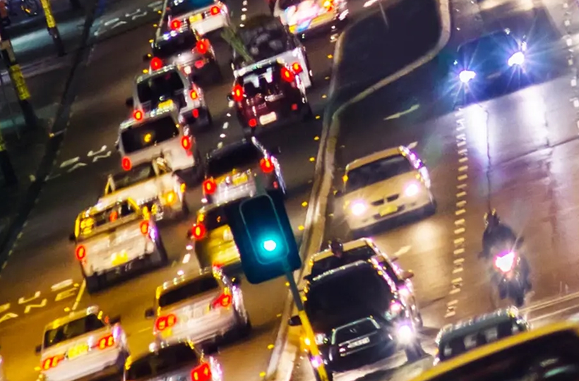 Image of cars in city traffic at night