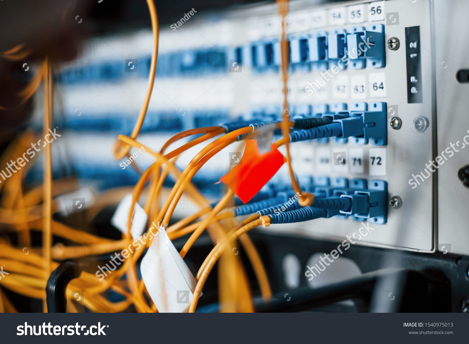 stock-photo-close-up-view-of-internet-equipment-and-cables-in-the-server-room-1540975013.jpg