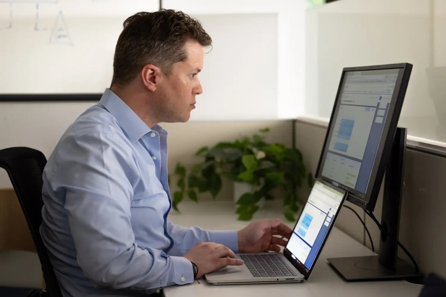 Finance professional using a centralized billing software to handle multiple client accounts with varied billing structures