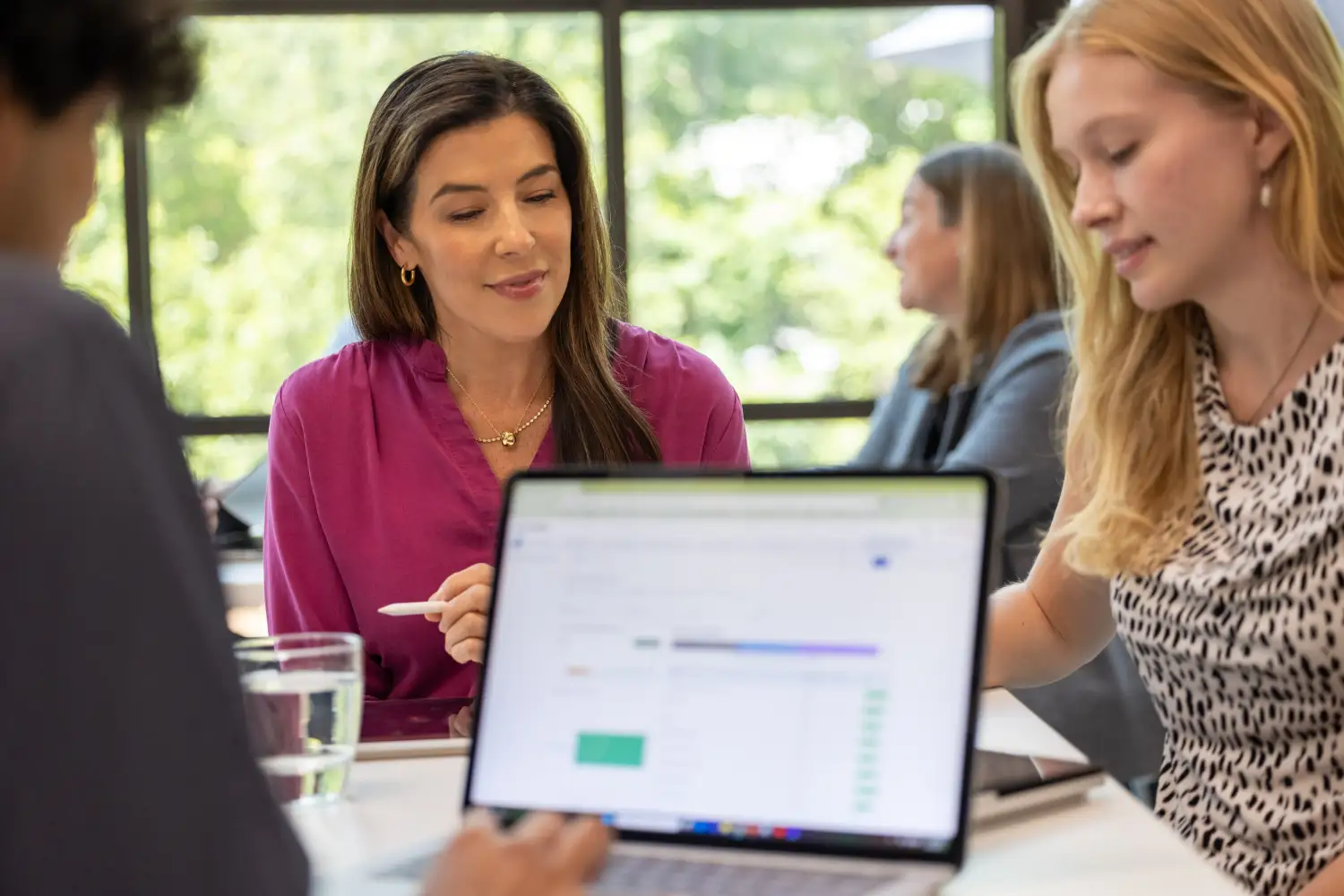 Image of project managers using Certinia PS Cloud to help with project planning and decision-making