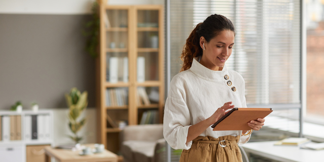 Modern Businesswoman Using Tablet