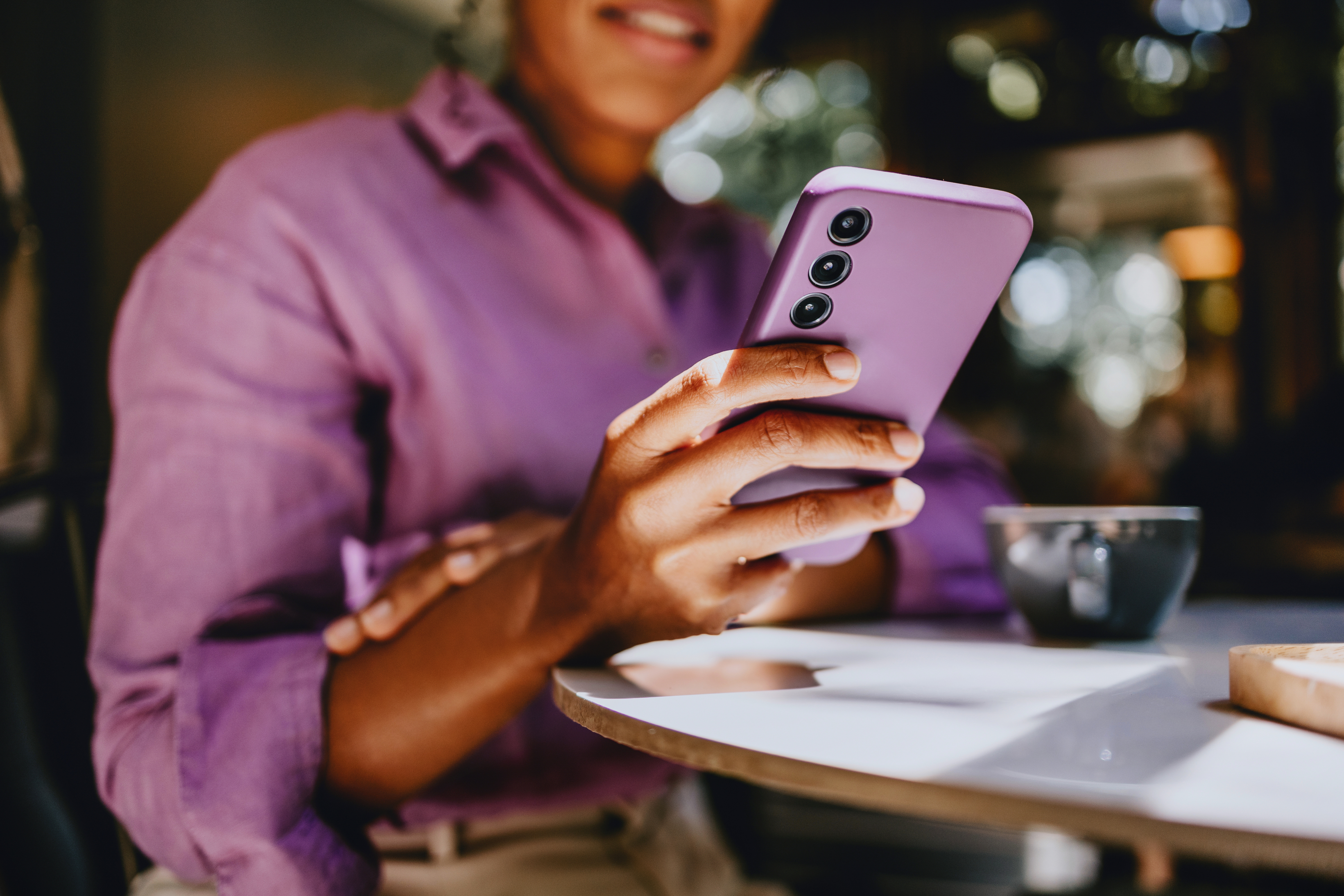 customer looking at mobile phone