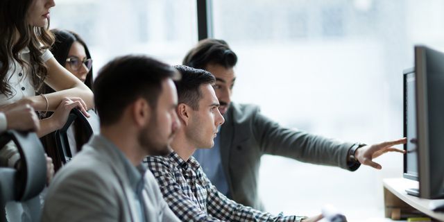 Picture of business people working together in office