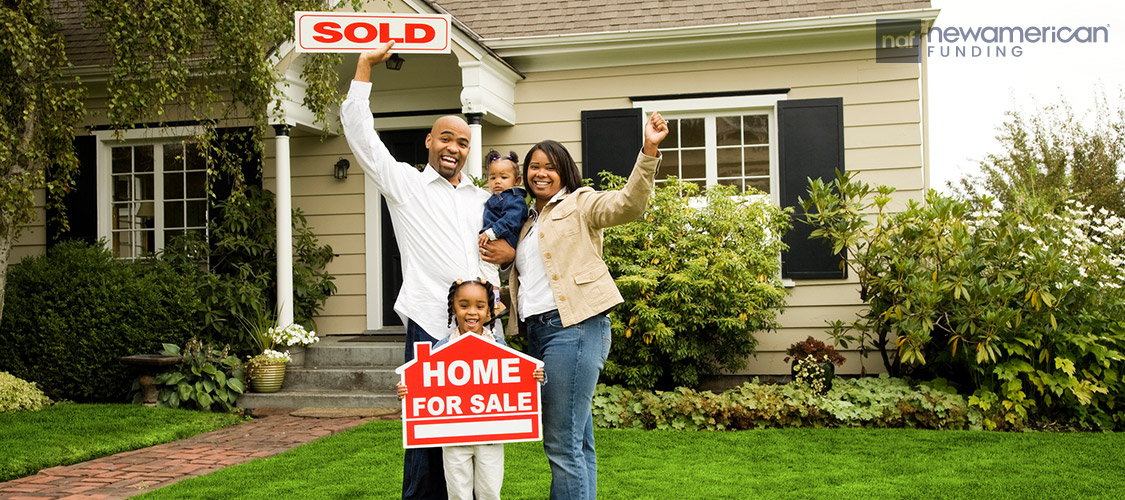 family celebrating home purchase