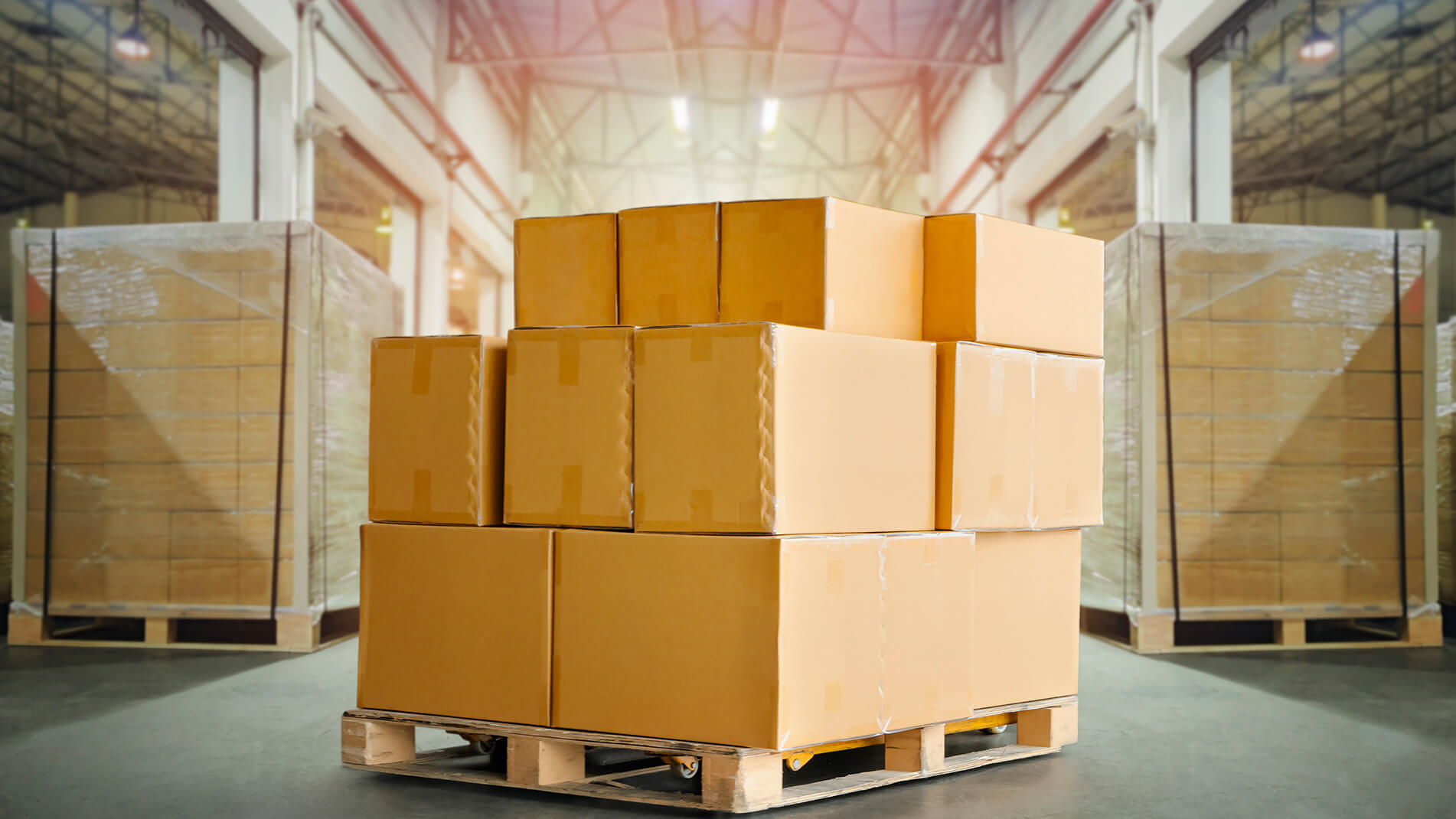 1902x1070_scp_replenishment_wholesale.jpg Image of boxes on a pallet in a warehouse.