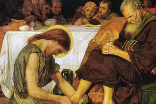 A man washing someone's feet