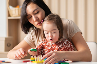 Woman playing with her child